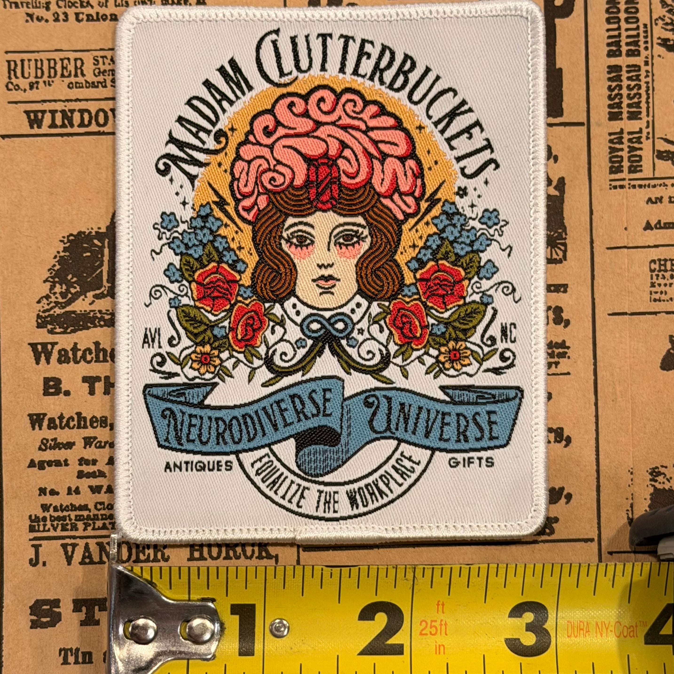 Madam Clutterbucket's Neurodiverse Universe Logo Patch with White Background