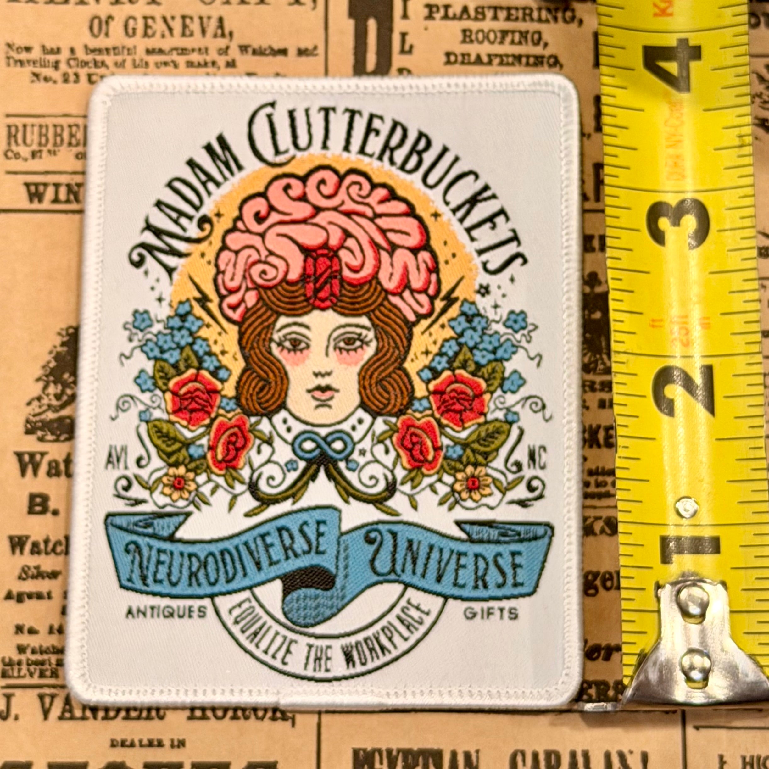 Madam Clutterbucket's Neurodiverse Universe Logo Patch with White Background