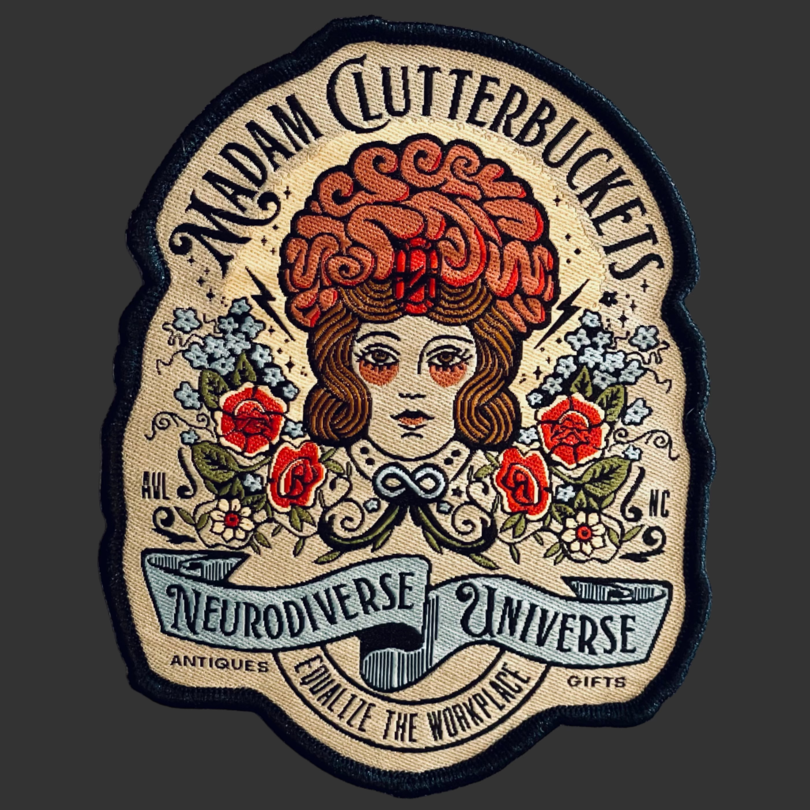 Patch Madam Clutterbuckets Neurodiverse Universe store logo.  It has an illustration of a woman with a brain hat over their hair, surrounded by flowers, on a beige background.