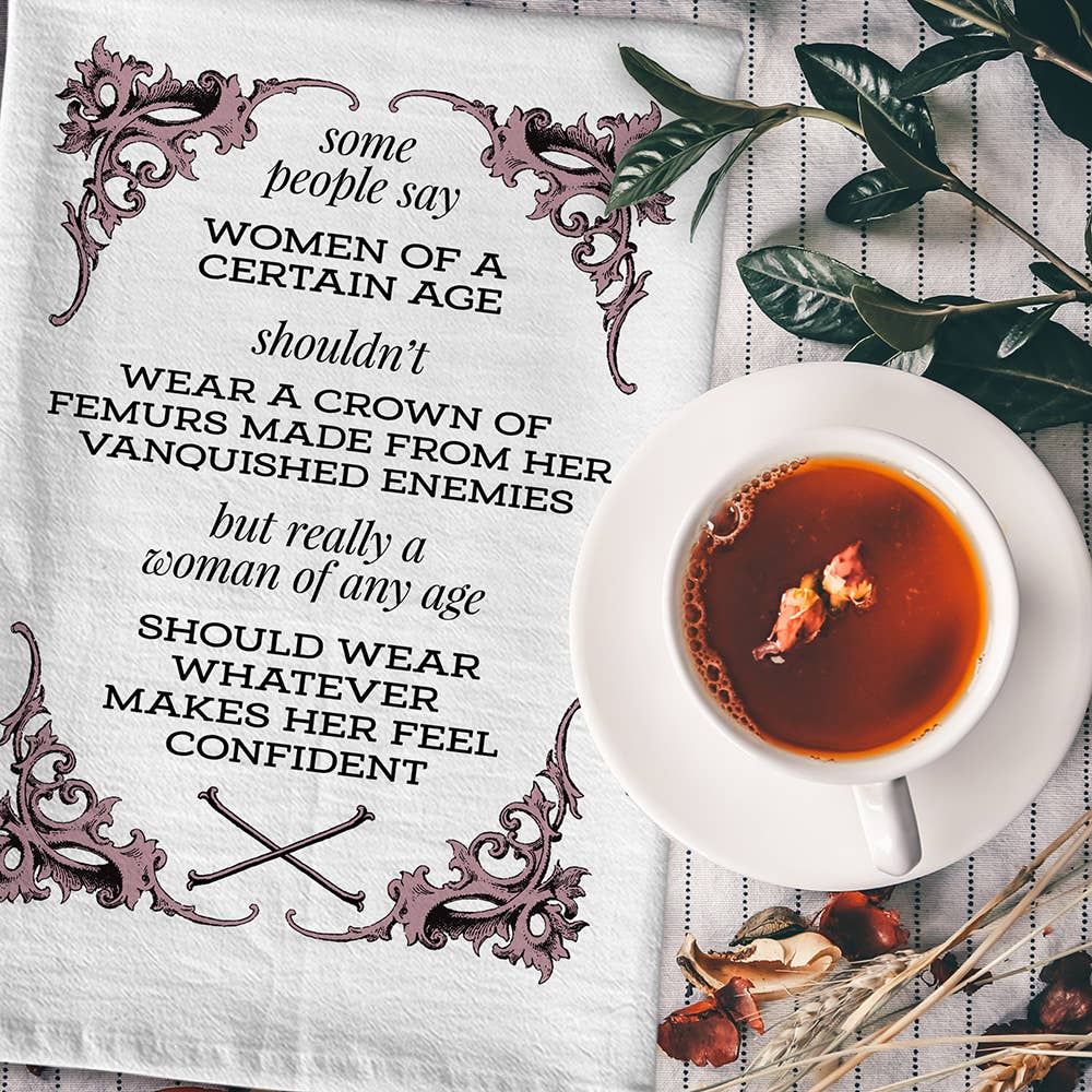 "Some people say women of a certain age shouldn’t wear a crown of femurs made from her vanquished enemies, but really a woman of any age should wear what makes her feel confident." dish towel