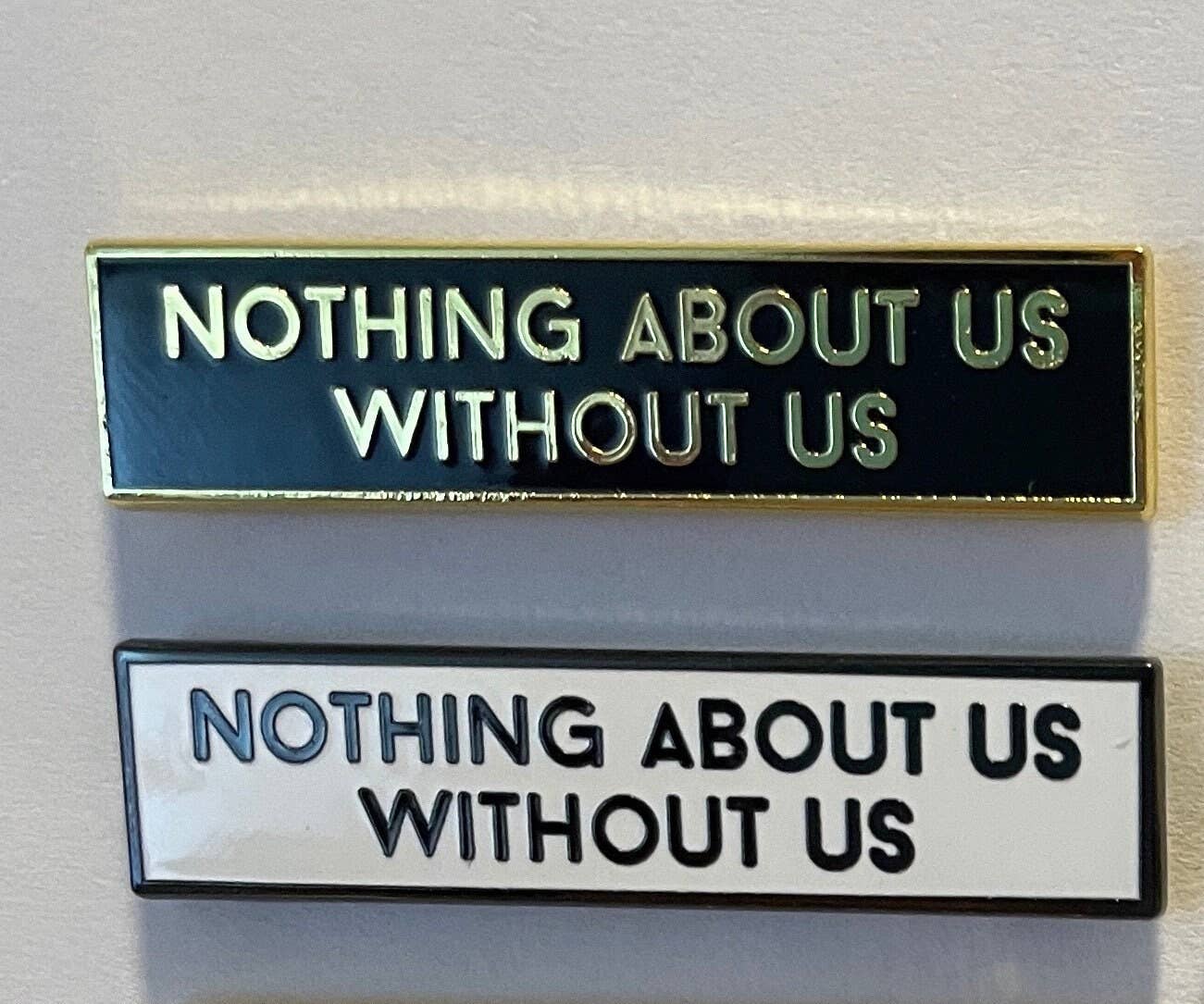 "Nothing About Us Without Us" Enamel Disability Activism Pin - Black and White